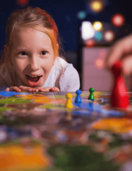 Child playing board game