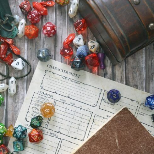 Dice and character sheet used for role playing games