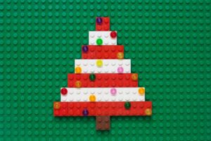 a closeup of a Christmas tree constructed from Lego® bricks