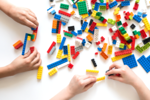 children playing with Lego bricks 